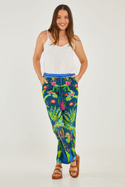 Model Georgia wearing size S of the Blair Pant in colour Navy (Blue), from the front, showing the whole outfit