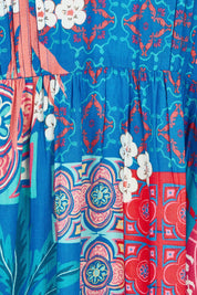 Product shot of the Busena Dress in colour Ocean, detail