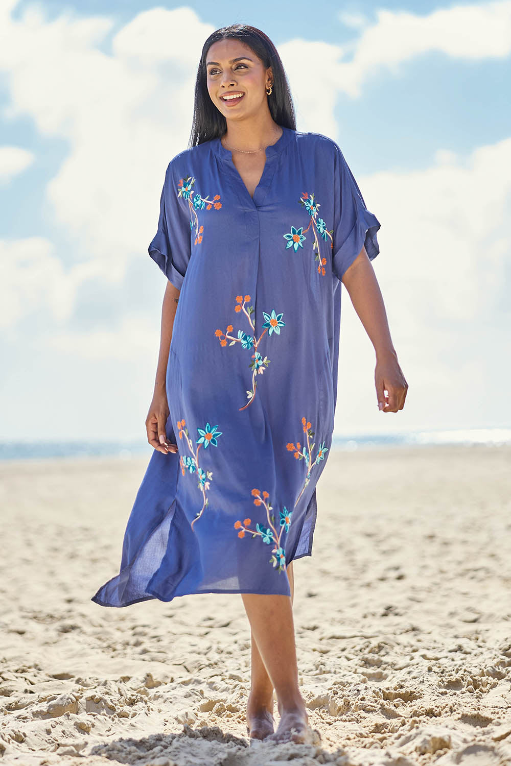 Model Eshan wearing size 10 of the Casita Kaftan Dress – Navy in colour Navy, from the front