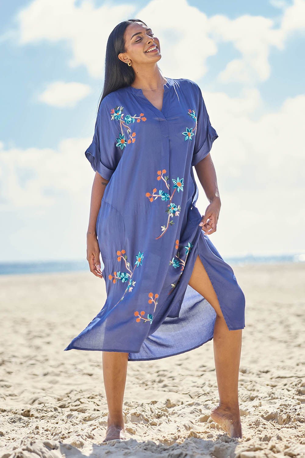 Model Eshan wearing size 10 of the Casita Kaftan Dress – Navy in colour Navy, from the front