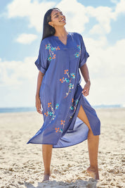 Model Eshan wearing size 10 of the Casita Kaftan Dress – Navy in colour Navy, from the front