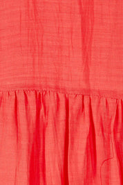 Product shot of the Delilah Dress in colour Melon (Pink), detail