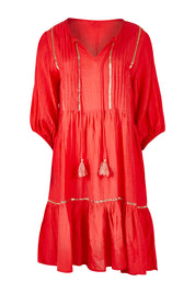 Product shot of the Delilah Dress in colour Melon (Pink), from the front