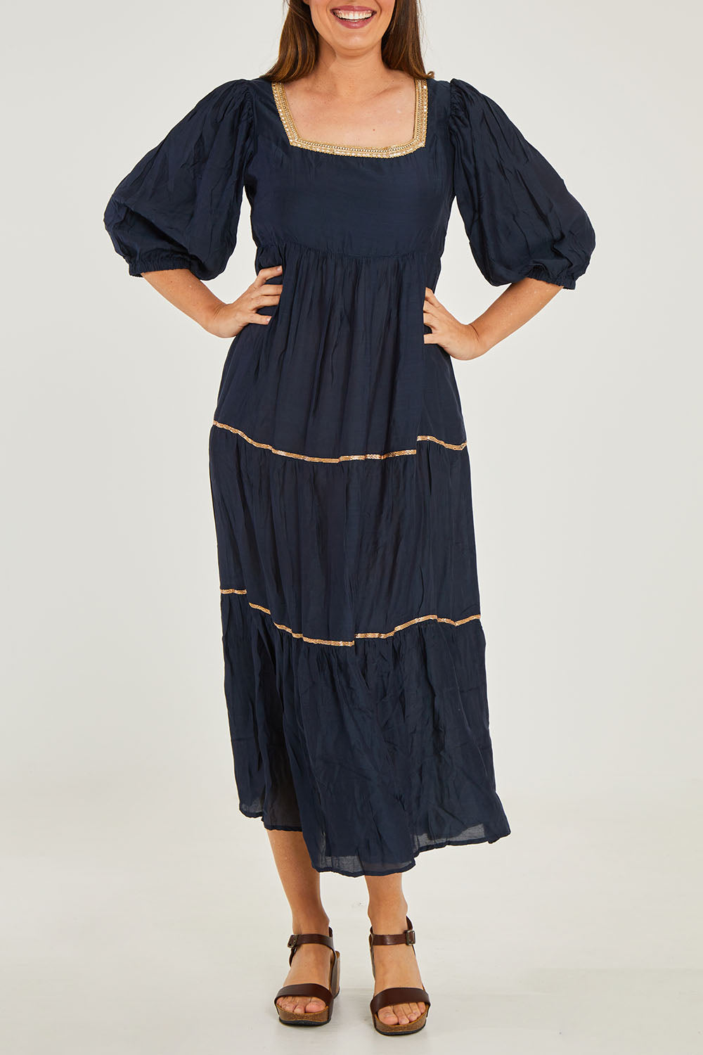 Model Georgia wearing size S of the Delilah Maxi in colour Ink (Blue), from the front, cropped image