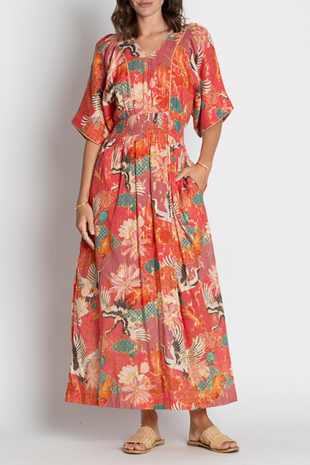 A model wearing the Hoshino Maxi in colour Pink, from the front, cropped image