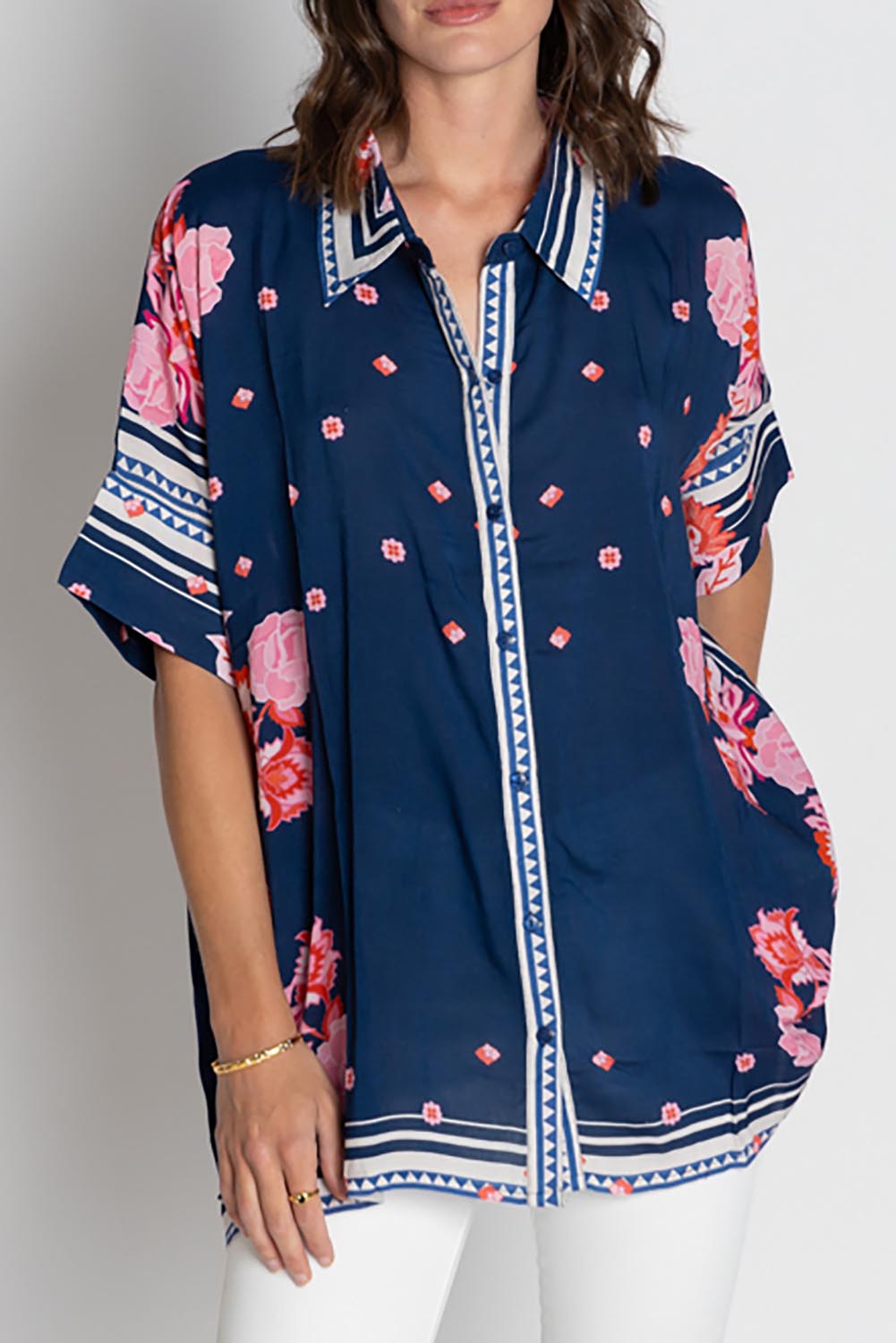A model wearing the Ladera Kaftan Shirt in colour Navy (Blue), from the front, cropped image