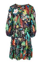 Product shot of the Lucile Tiered Dress in colour Midnight (Black), from the back