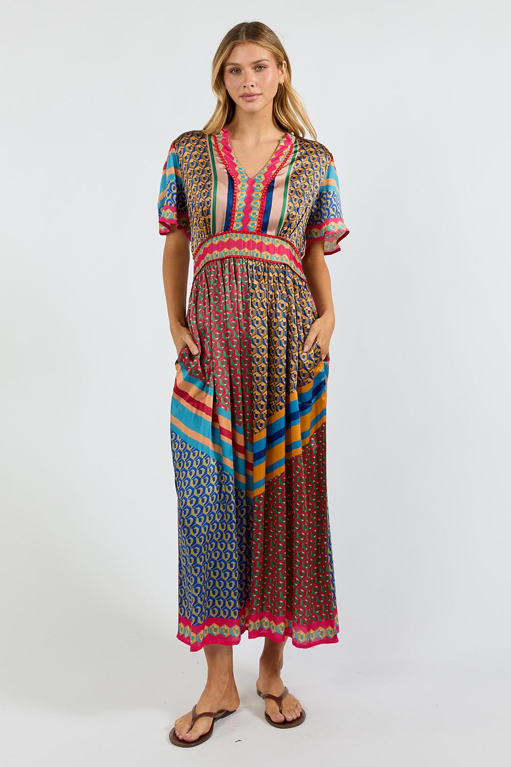 Model Genericm wearing size sample of the Maison Midi Dress – Print in colour Print, from the front