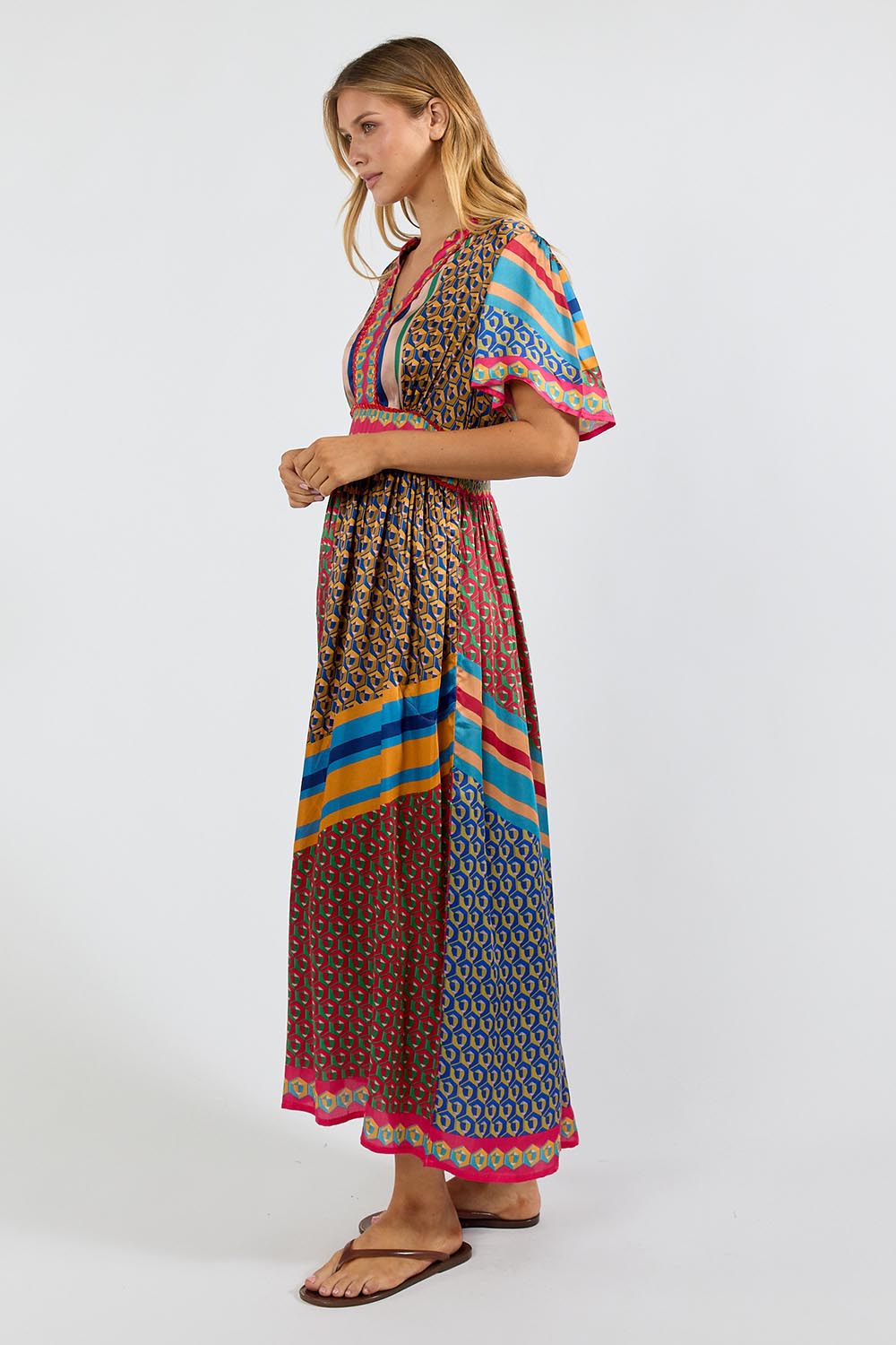 Model Genericm wearing size sample of the Maison Midi Dress – Print in colour Print, from the front