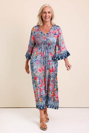 Model Sandys wearing size 10 of the La Maroma Dress – Indigo in colour Indigo, from the front