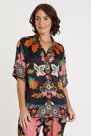 A model wearing the Marquis Modal Blend Top in colour Black (Black), from the front, cropped image