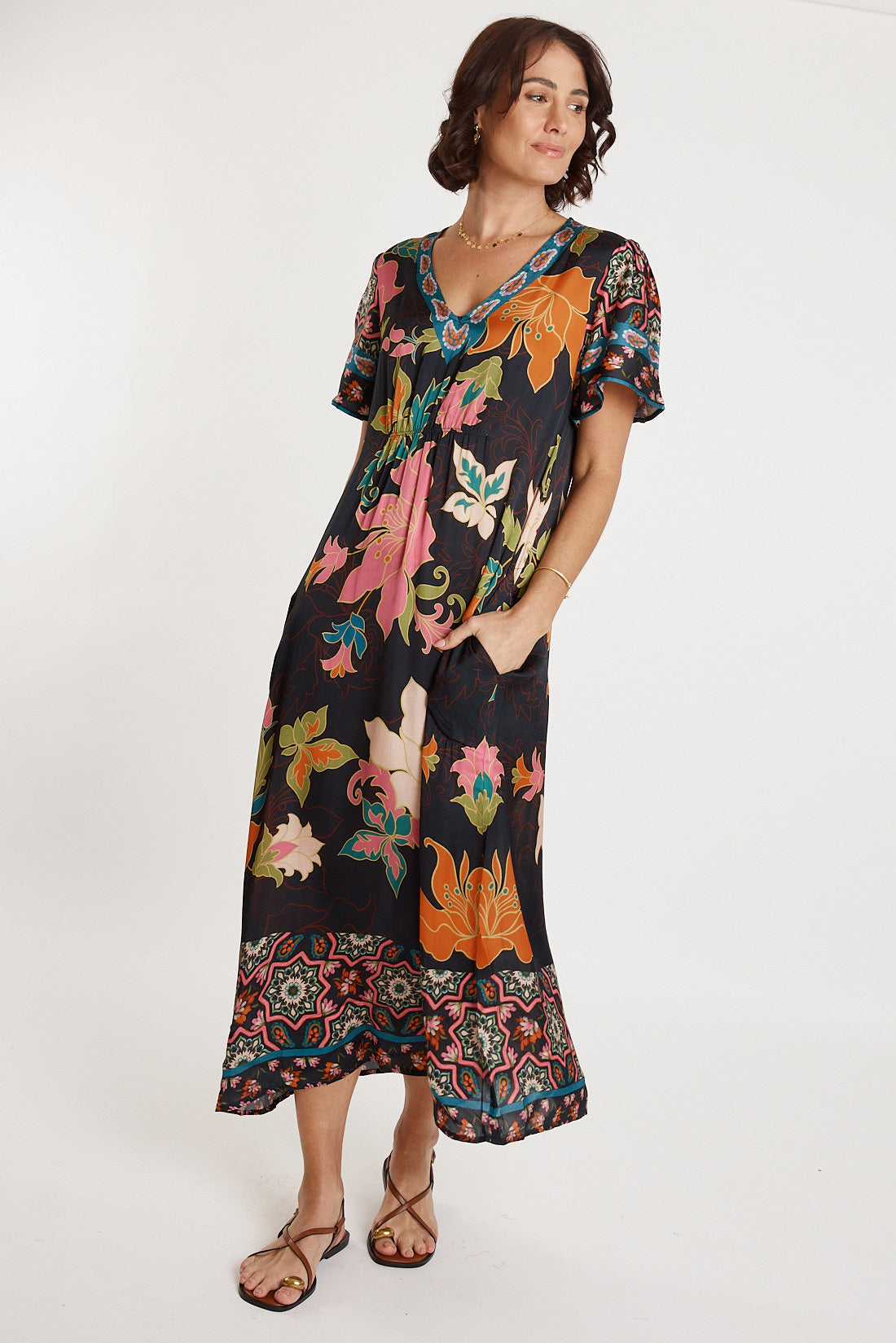 A model wearing the Marquis Modal Blend Midi Dress in colour Black (Black), from the front, showing the whole outfit