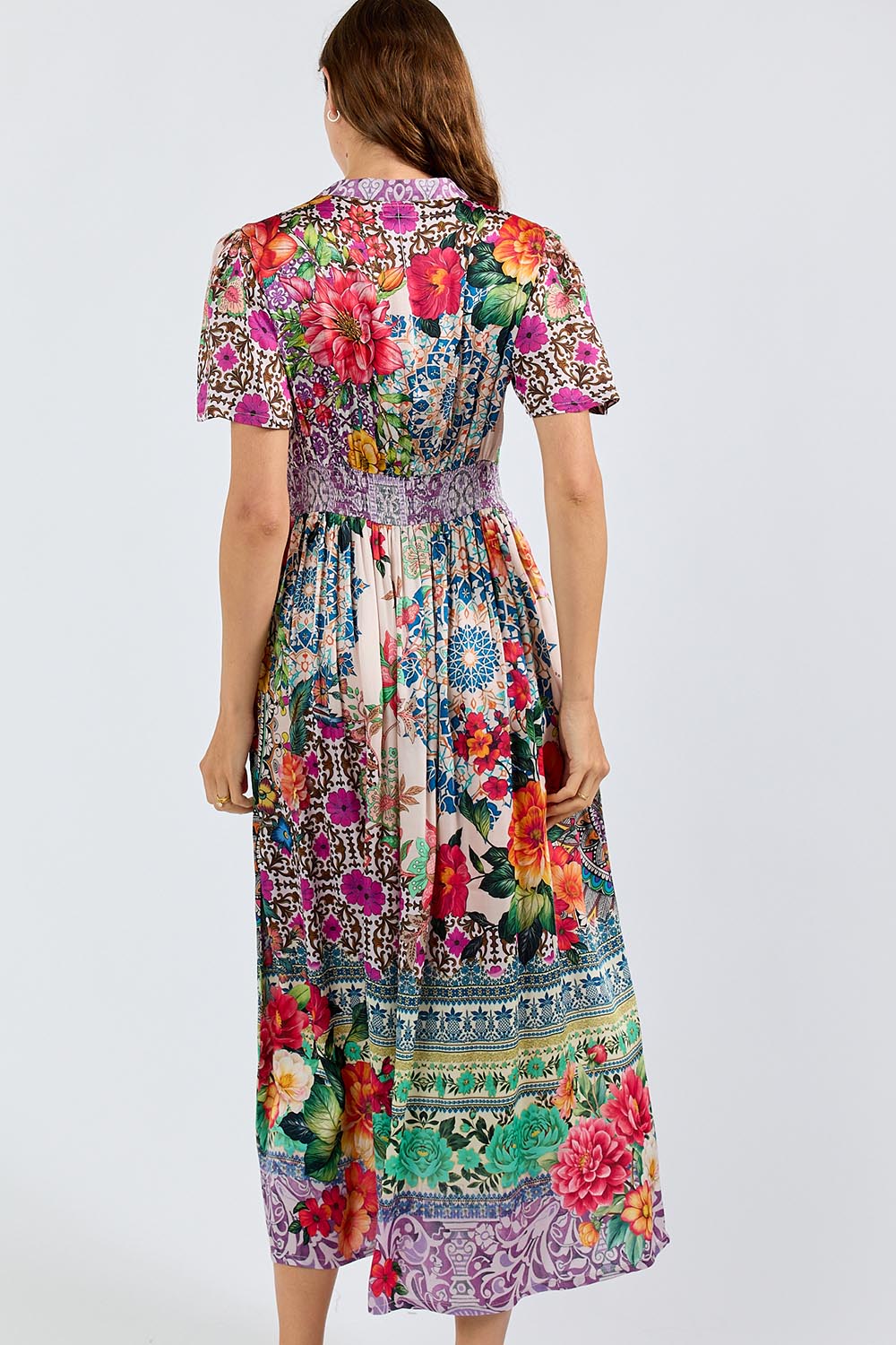 Model Genericm wearing size sample of the Miraval Midi Dress – Lilac in colour Lilac, from the back