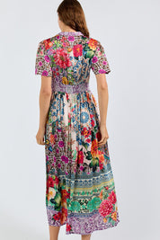 Model Genericm wearing size sample of the Miraval Midi Dress – Lilac in colour Lilac, from the back