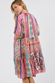 Model Genericm wearing size sample of the Miramar Dress – Print in colour Print, from an angle