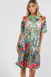 Model Genericm wearing size sample of the Miraval Dress – Mint in colour Mint, in a cropped view