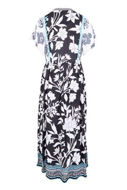 Product shot of the Paloma Midi Dress - Print in colour Print, from the back