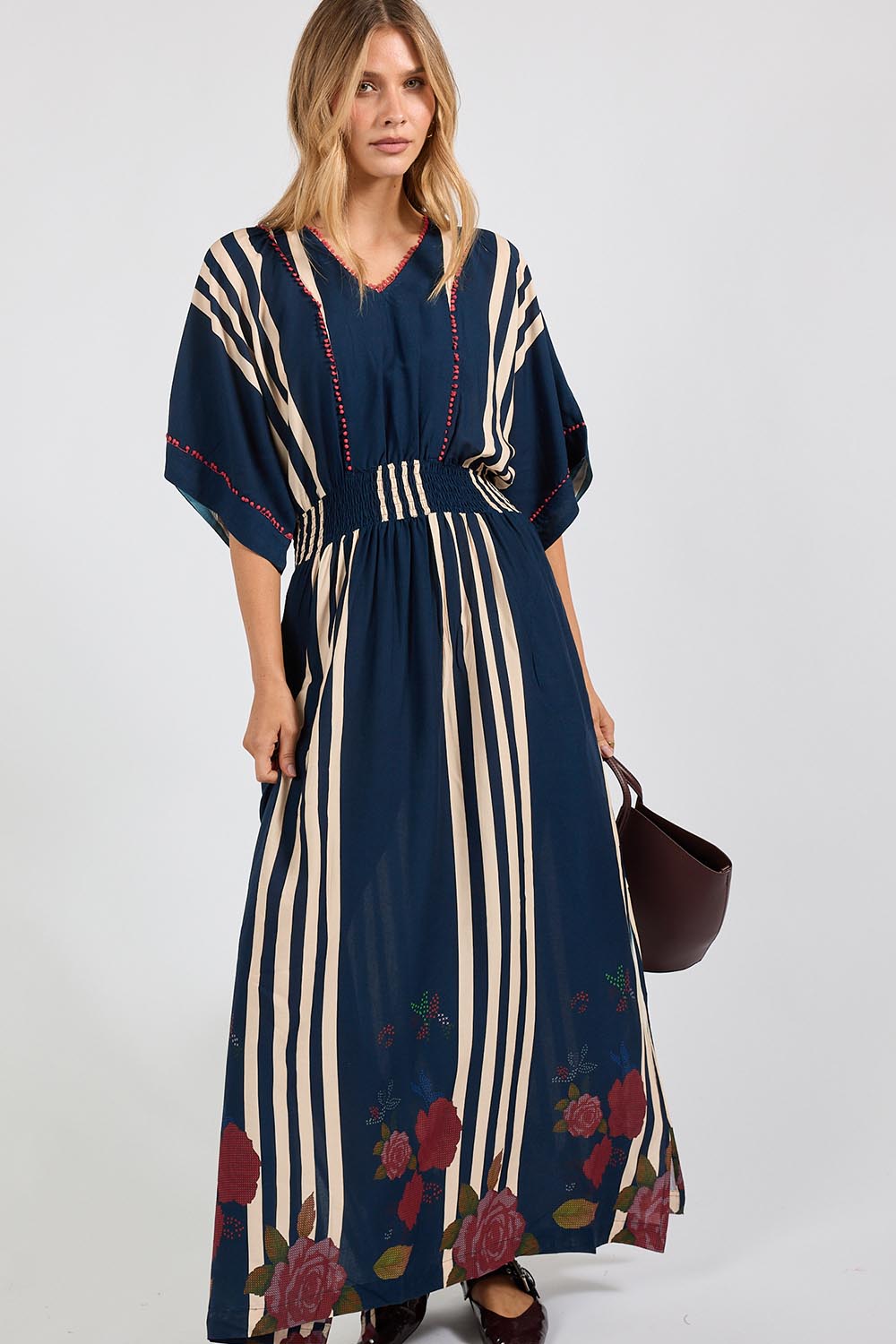 Model Genericm wearing size sample of the Sandos Maxi Dress – Navy in colour Navy, from the front