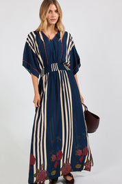 Model Genericm wearing size sample of the Sandos Maxi Dress – Navy in colour Navy, from the front