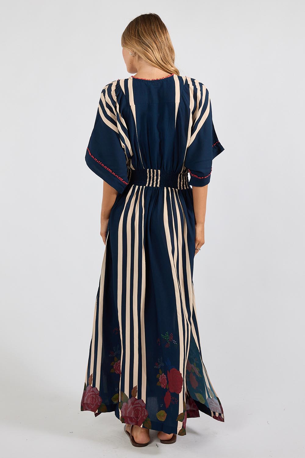Model Genericm wearing size sample of the Sandos Maxi Dress – Navy in colour Navy, from the front