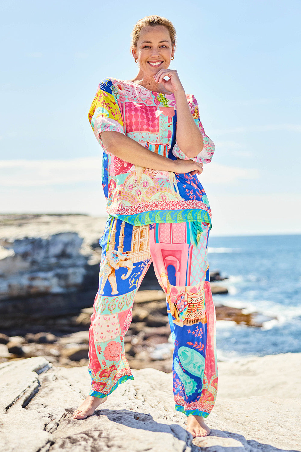 Model Bianca wearing size S of the Taj Wide Tee in colour Multi, from the front, showing the whole outfit