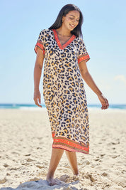 Model Eshan wearing size 10 of the Wild Safari Dress - Print in colour Print, from the front