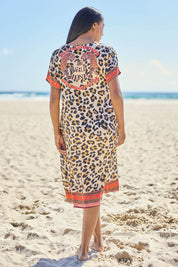 Model Eshan wearing size 10 of the Wild Safari Dress - Print in colour Print, from the front