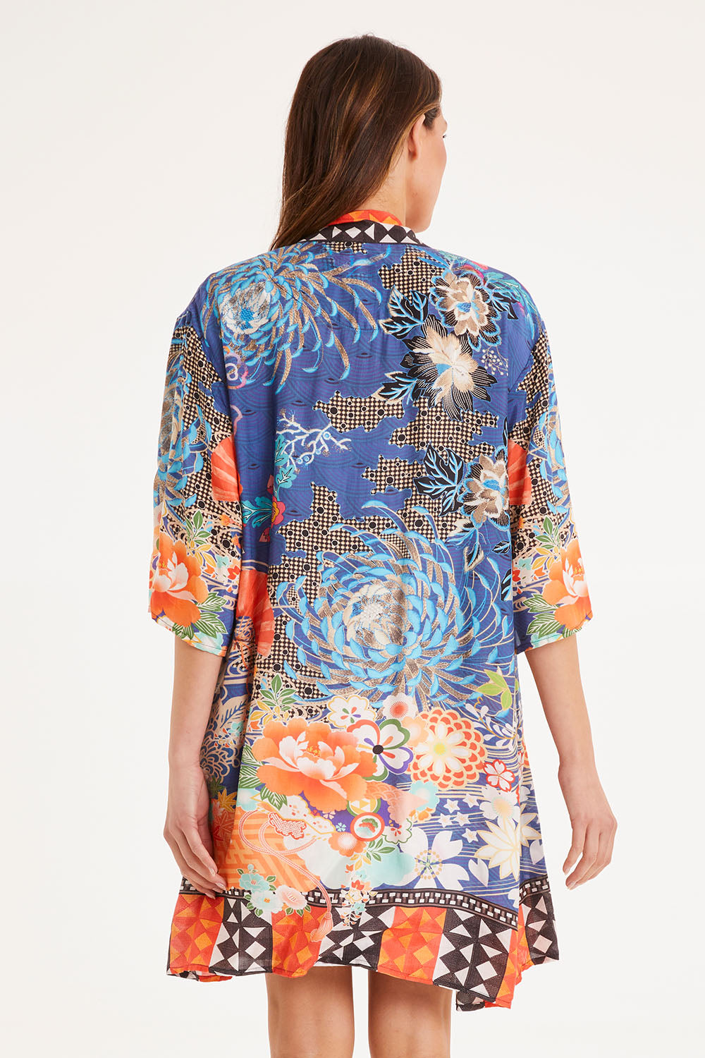 Model Madeline wearing size S of the Yoko Kimono in colour Navy (Blue), from the back