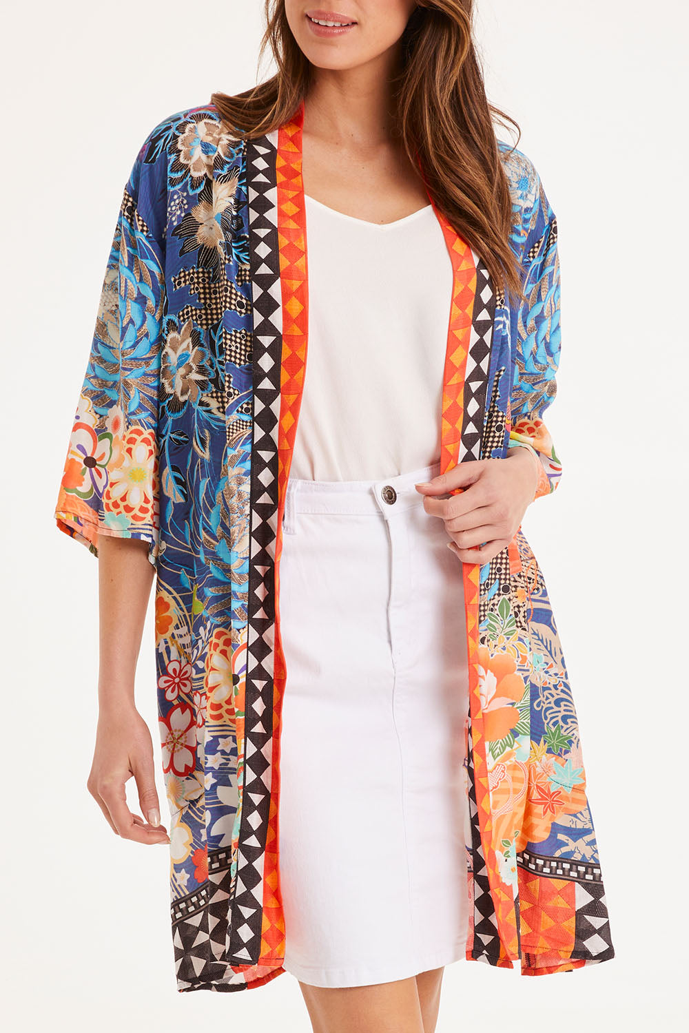 Model Madeline wearing size S of the Yoko Kimono in colour Navy (Blue), from the front, cropped image