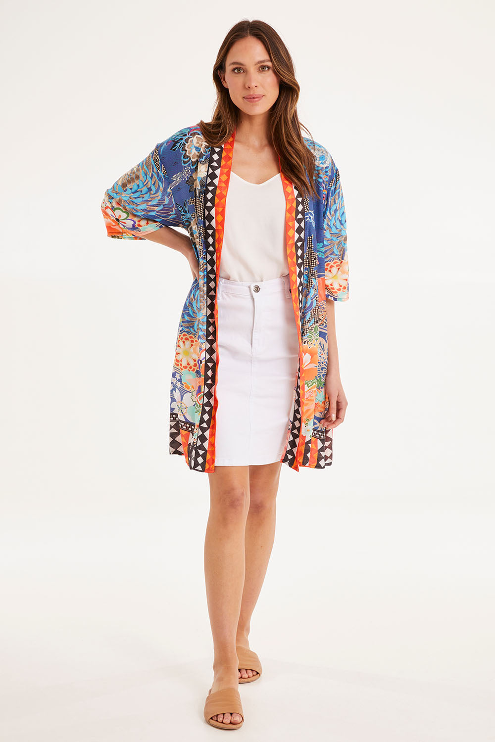 Model Madeline wearing size S of the Yoko Kimono in colour Navy (Blue), from the front, showing the whole outfit