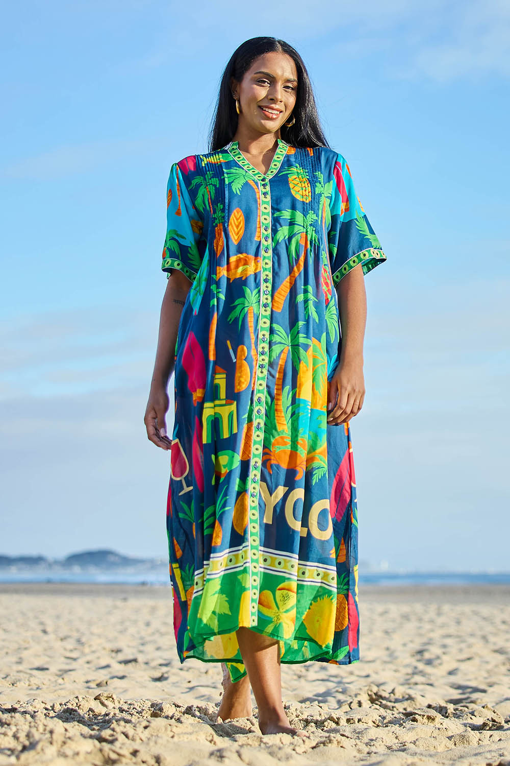 Model Eshan wearing size 10 of the Yolo Button Midi Dress – Navy in colour Navy, from the front