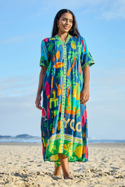 Model Eshan wearing size 10 of the Yolo Button Midi Dress – Navy in colour Navy, from the front