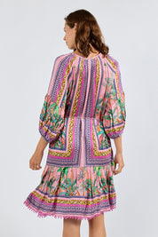Model Genericm wearing size sample of the Zilara Dress – Orchid in colour Orchid, from the back