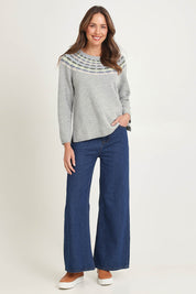 Model Madeline wearing size S of the Brigitte Lambswool Sweater in colour Grey (Grey), from the front, showing the whole outfit