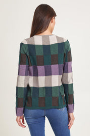 Model Madeline wearing size S of the Lillith Organic Cotton Sweater in colour Coldgreen (Green), from the back