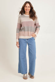 Model Madeline wearing size S of the Louise Lambswool Sweater in colour Oat, from the front, showing the whole outfit