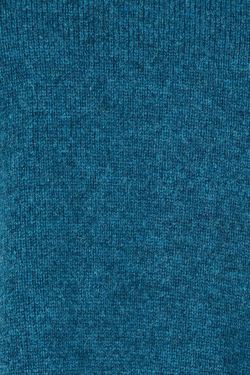 Product shot of the Mitos Vest in colour Darkaqua (Green), detail
