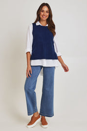 Model Madeline wearing size S of the Mitos Vest in colour Darkblue (Blue), from the front, showing the whole outfit