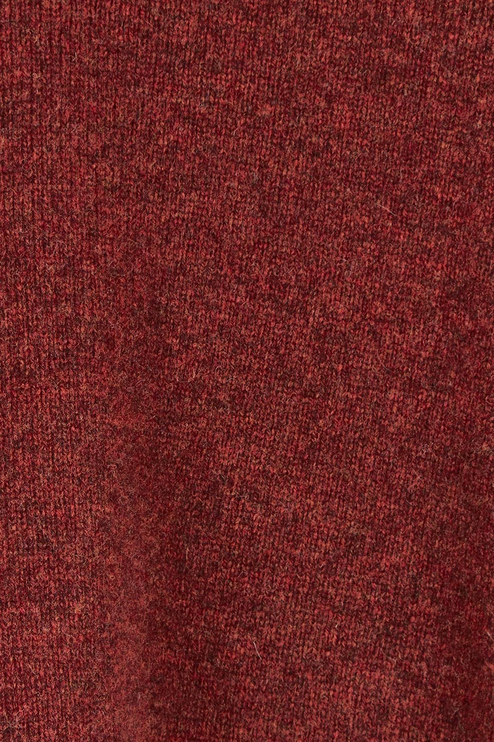 Product shot of the Mitos Vest in colour Spice, detail