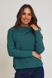 Model Madeline wearing size S of the Mosque Sweater in colour Sea (Green), from the front, cropped image