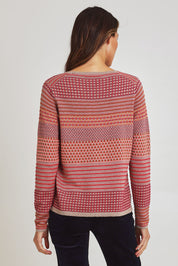 Model Madeline wearing size S of the Rihanna Organic Cotton Sweater in colour Mushroom, from the back