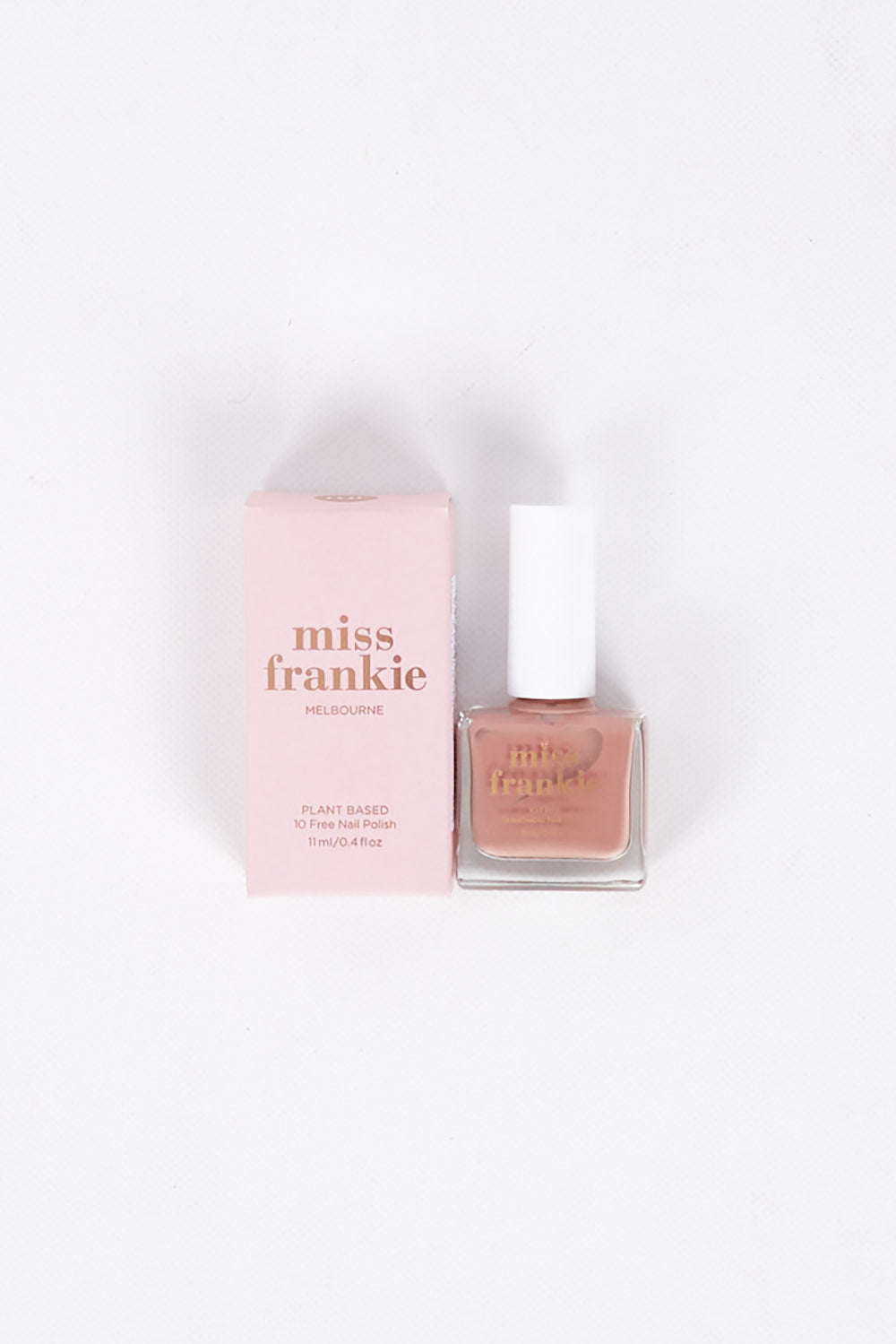 A model wearing size OneSize of the Chip Resistant Nail Polish in colour Firstdate (Red), from the front, showing the whole outfit