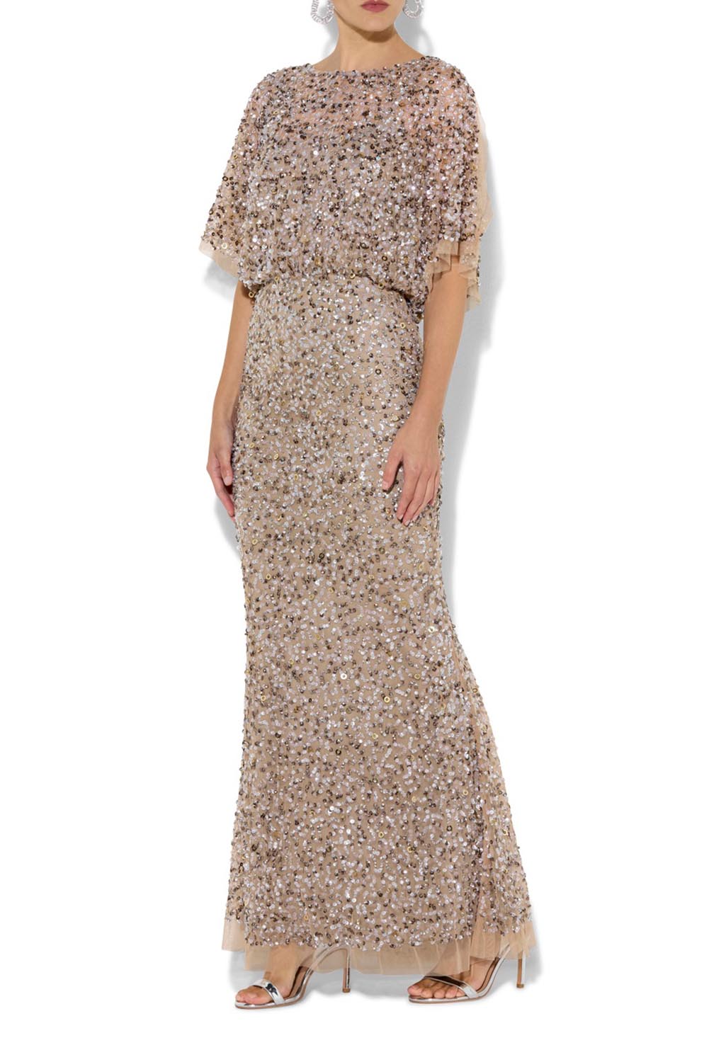 A model wearing the Mimi Hand Beaded Gown in colour Mink, from the front, cropped image