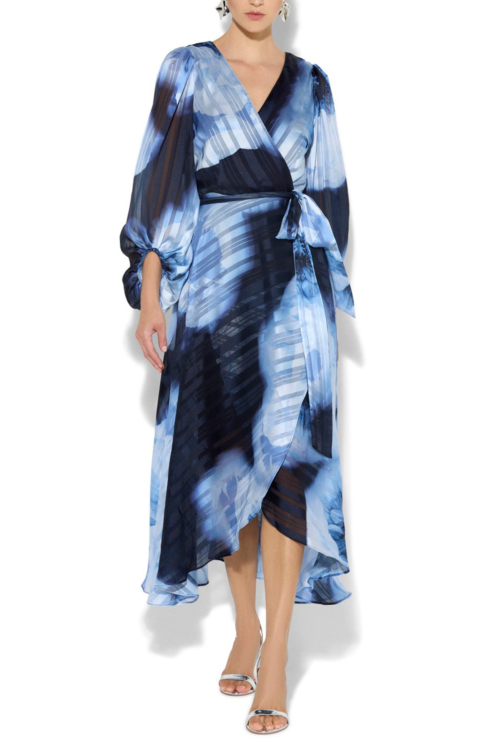 A model wearing the Salina Printed Maxi Dress in colour Navysky (Blue), from the front, cropped image