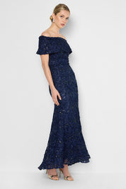 Model Genericm wearing size sample of the Emerson Off The Shoulder Gown - Navy in colour Navy, from the front