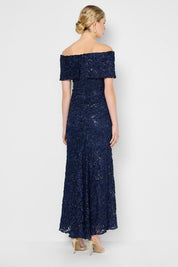 Model Genericm wearing size sample of the Emerson Off The Shoulder Gown - Navy in colour Navy, from the front