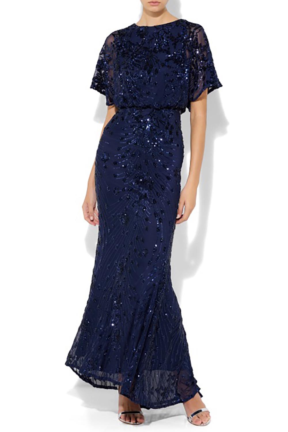 A model wearing the Aria Sequin Maxi Gown in colour Navy (Blue), from the front, cropped image