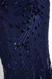 A model wearing the Aria Sequin Maxi Gown in colour Navy (Blue), from the front, cropped image