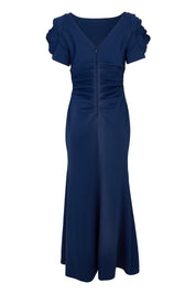Product shot of the Monet Rosette Sleeve Gown in colour Navy (Blue), from the back