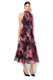 A model wearing the Imogen Merlot Floral Midi Dress in colour Merlot (Red), from the front, showing the whole outfit